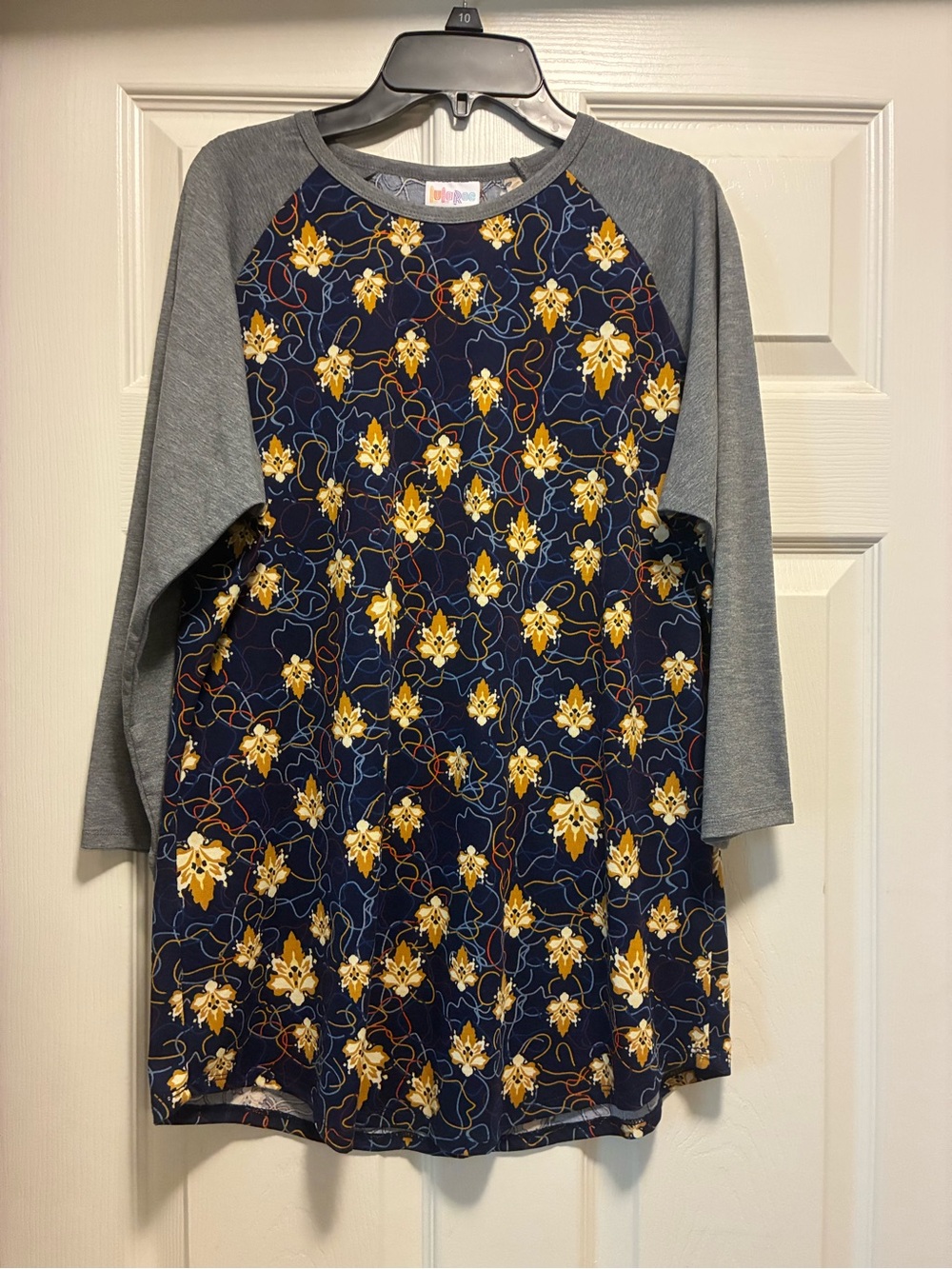 LuLaRoe Navy Floral Randy Top with Gray Sleeves size Large